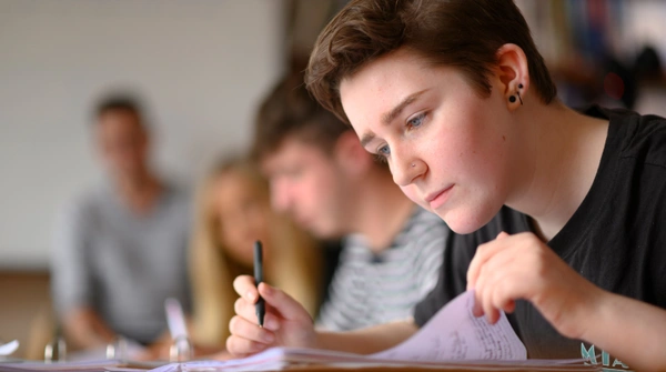 Focused student working in classroom