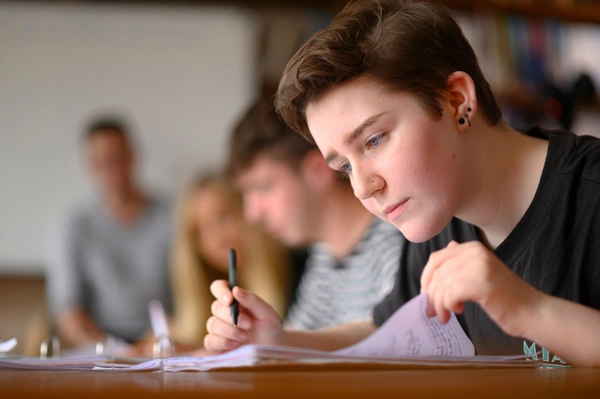 Focused student working in classroom